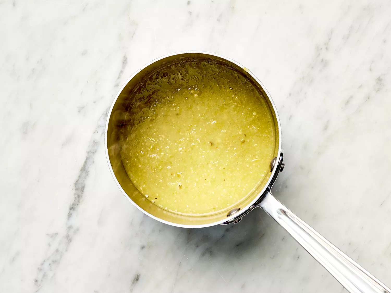 Green salsa in a saucepan