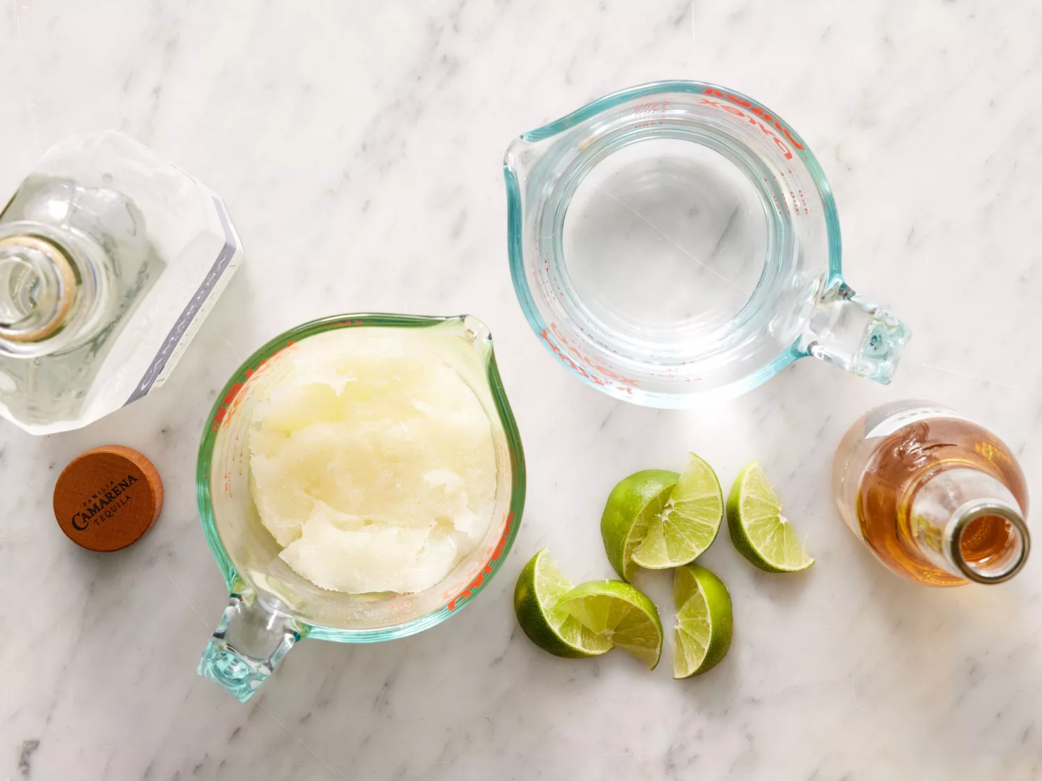 an overhead shot of all ingredients for beer margaritas