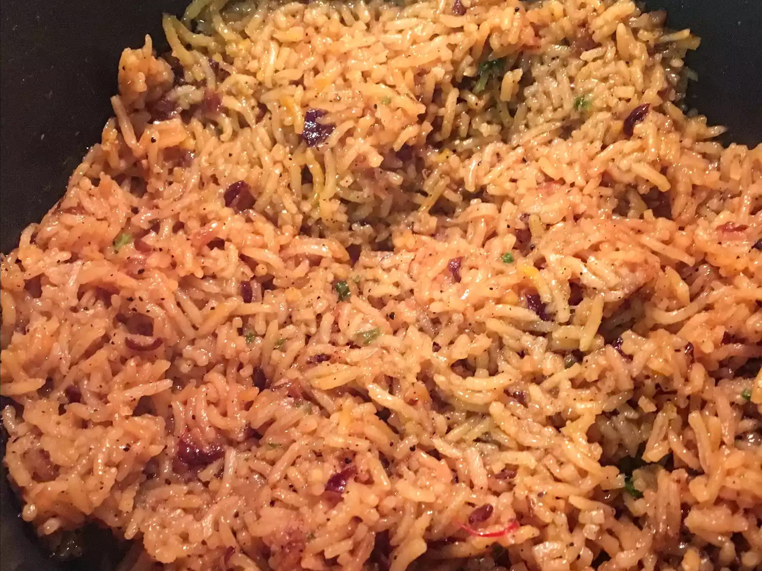 Close up view of saffron rice in a pan