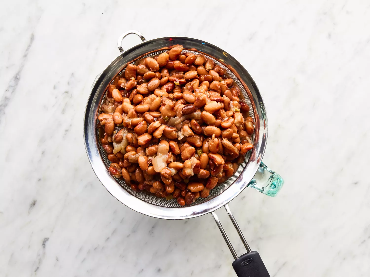 beans strained, reserving the cooking liquid in a bowl.