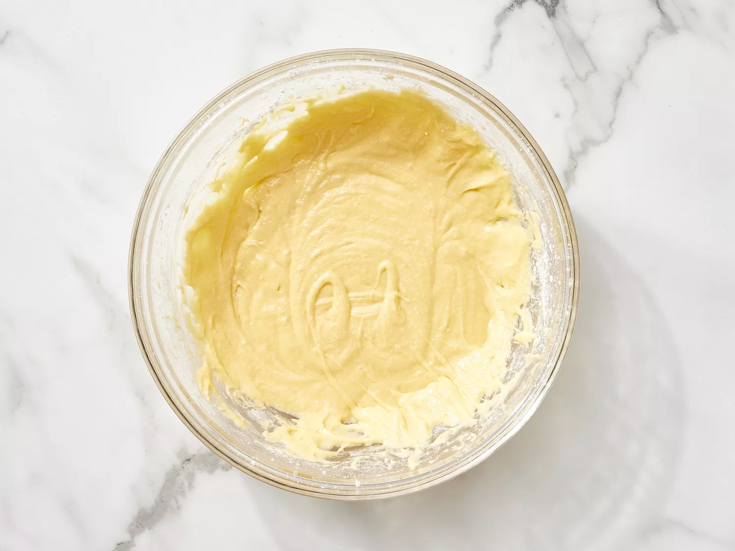 Cake batter in a glass bowl 