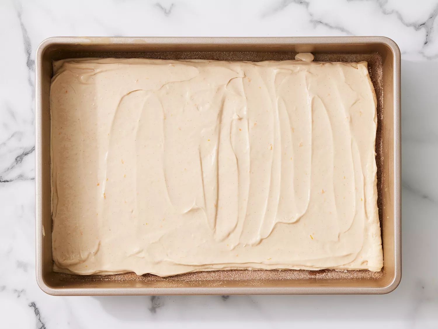 cream cheese mixture spread of bottom crescent layer. 