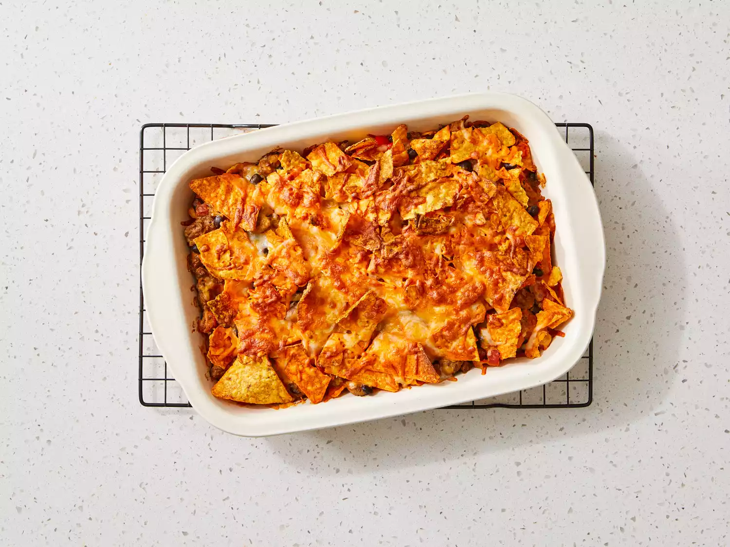 Dorito casserole baked until golden-brown. 