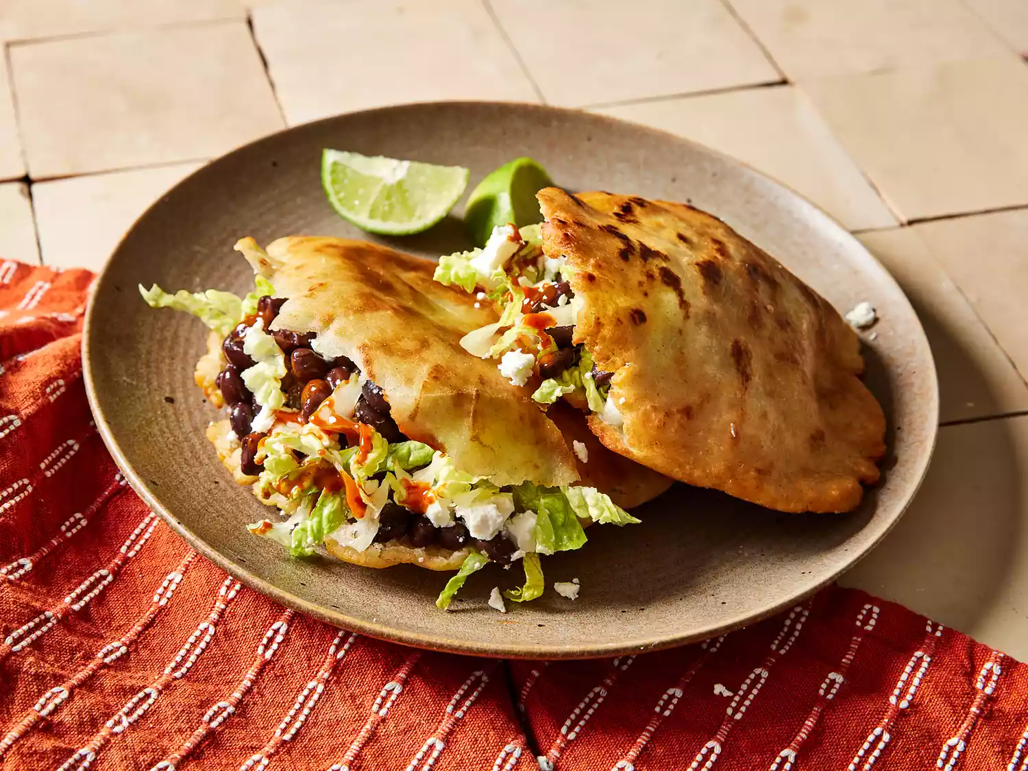 Close up on two filled gorditas
