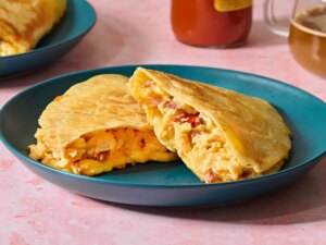 Best breakfast quesadilla halves on a blue plate