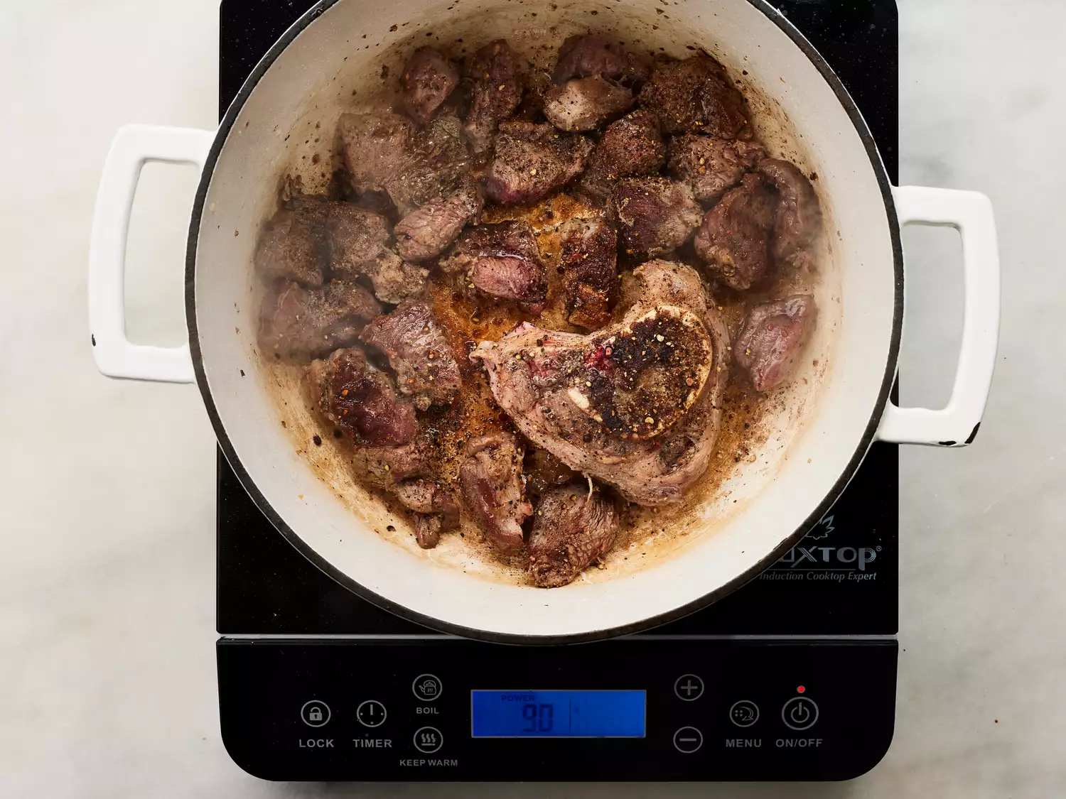 meat fully browned in the pan