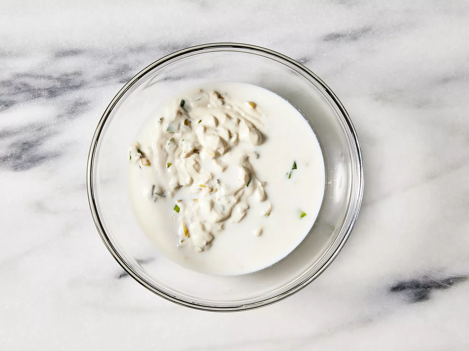 Milk stirred into reserved sauce.