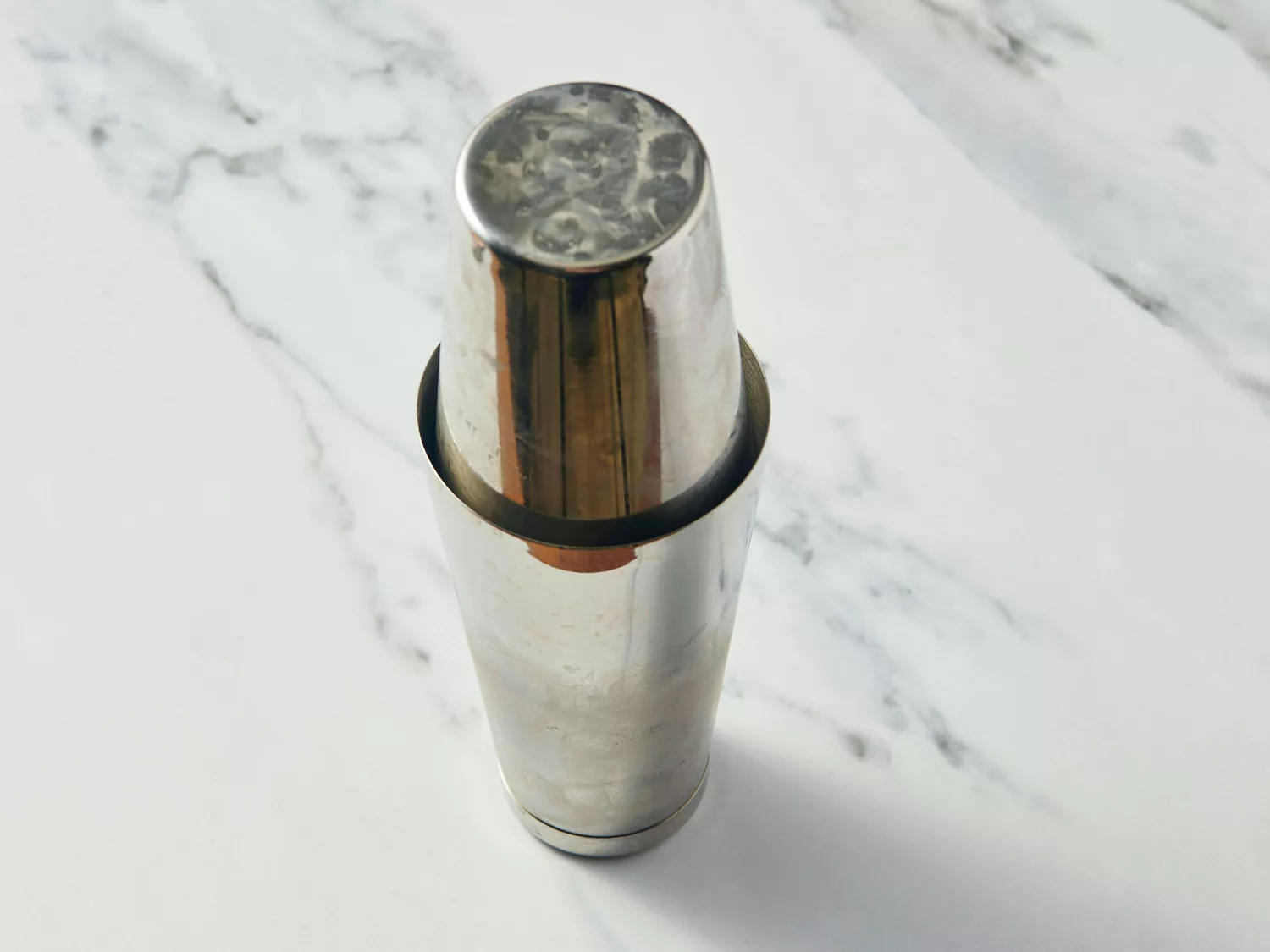Cocktail shaker sealed on a marble surface
