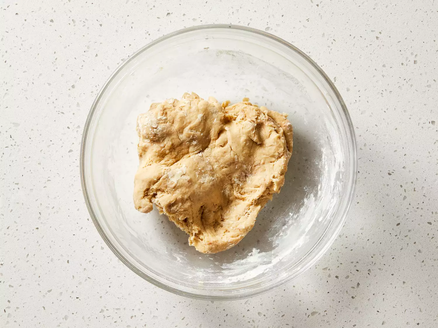 Flour and cinnamon gradually mixed in until dough comes together.