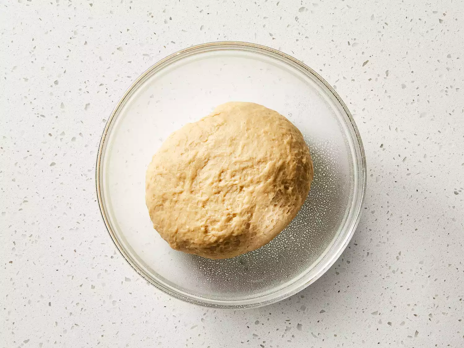 Once kneaded until smooth and elastic, place in a large greased bowl.
