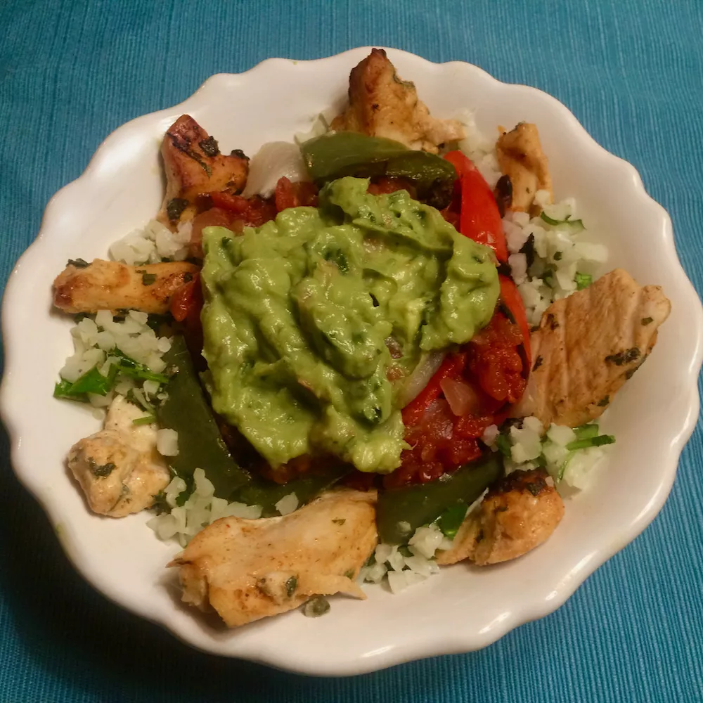 Chicken fajita and cilantro lime cauliflower rice bowls