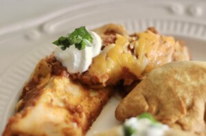 Green chili chicken enchiladas