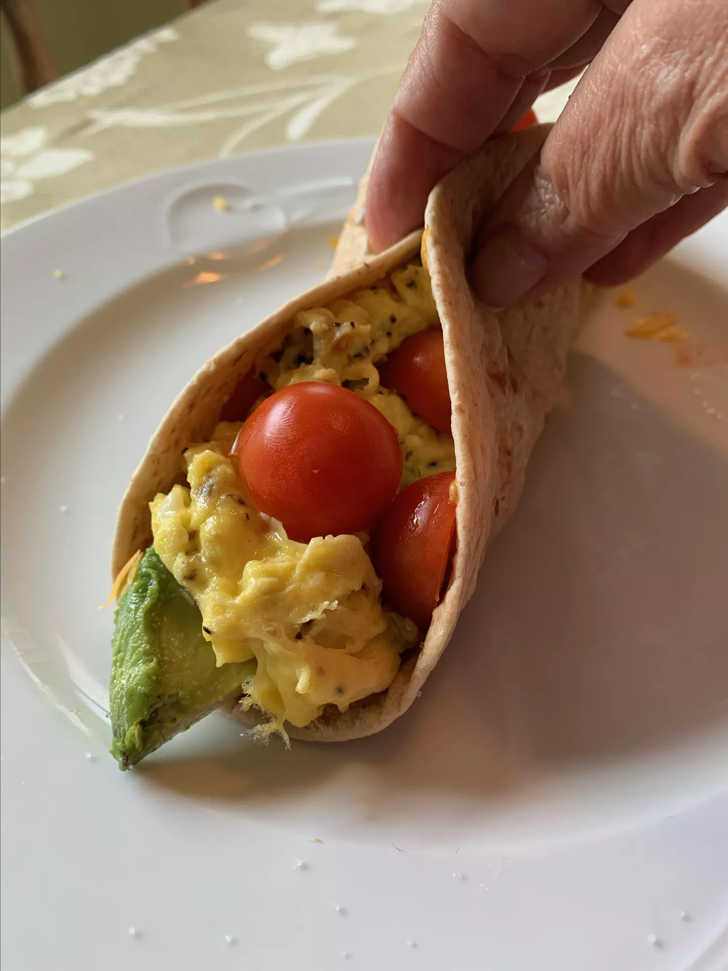 Avocado and egg breakfast burrito
