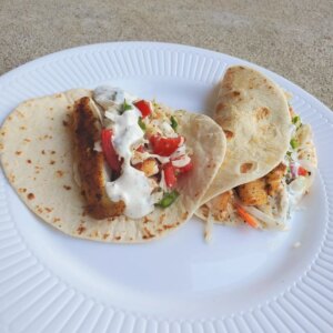 Fish tacos with cabbage salsa and yogurt sauce