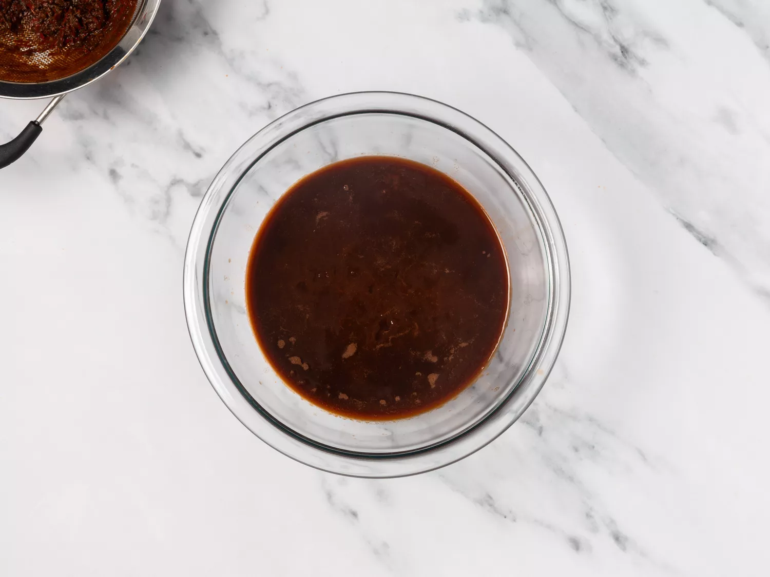 Pureed chilies in a glass bowl.