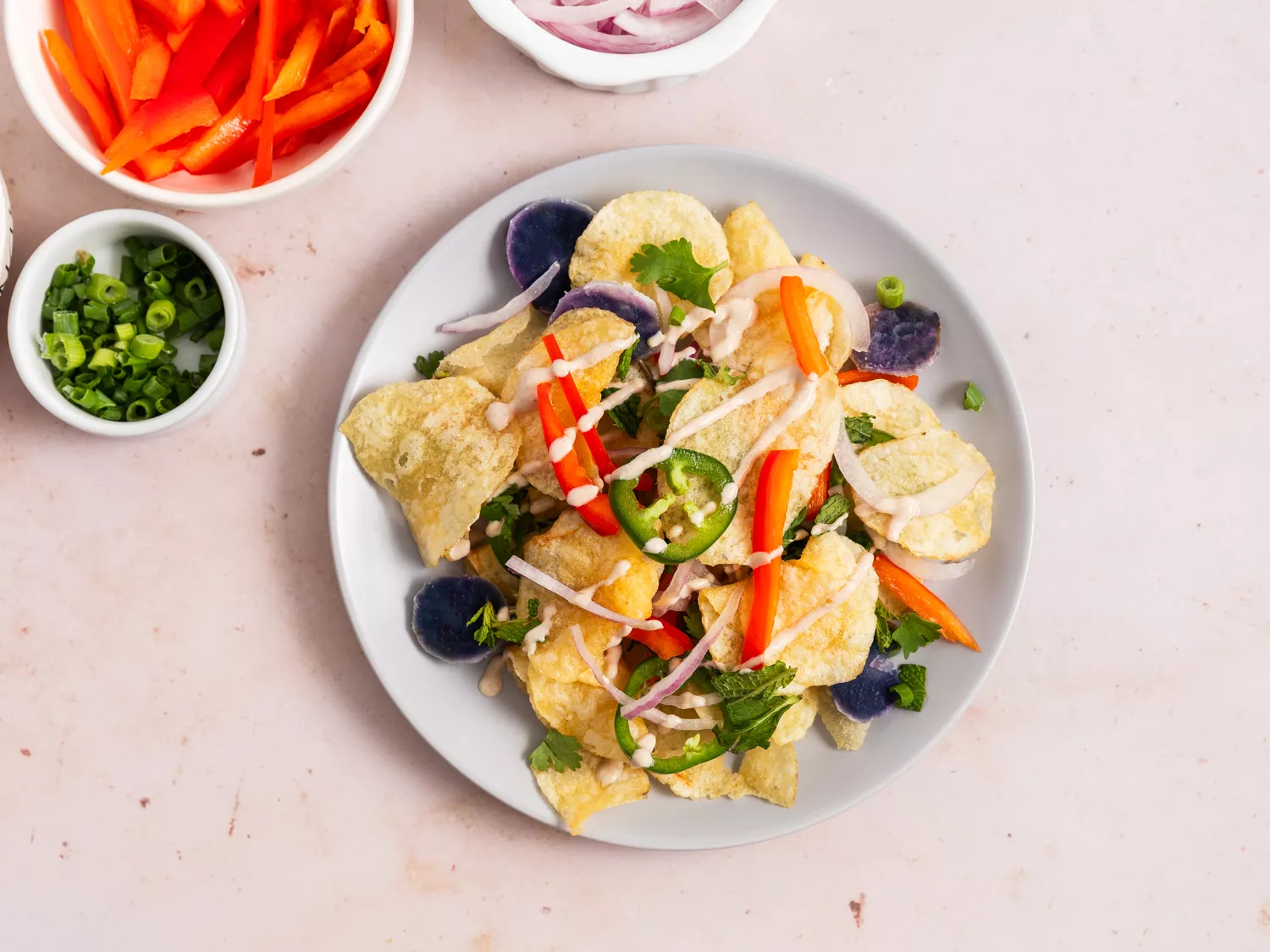 Indian Chaat-Inspired potato chip salad on a plate.