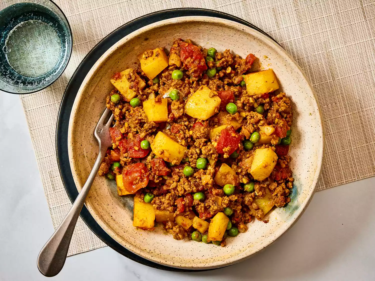A bowl of keema aloo (ground beef with potatoes)