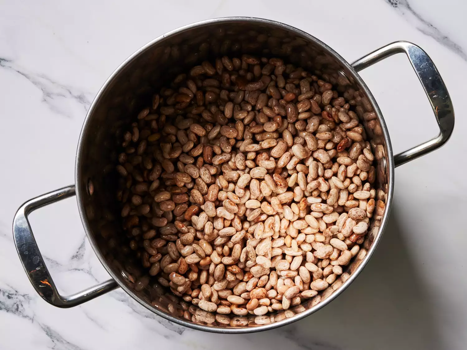 A large pot with pinto beans