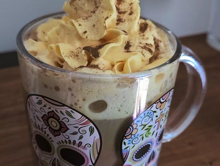 Mocha in cup with whipped cream