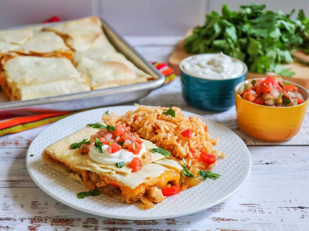 Sheet pan chicken fajita quesadillas