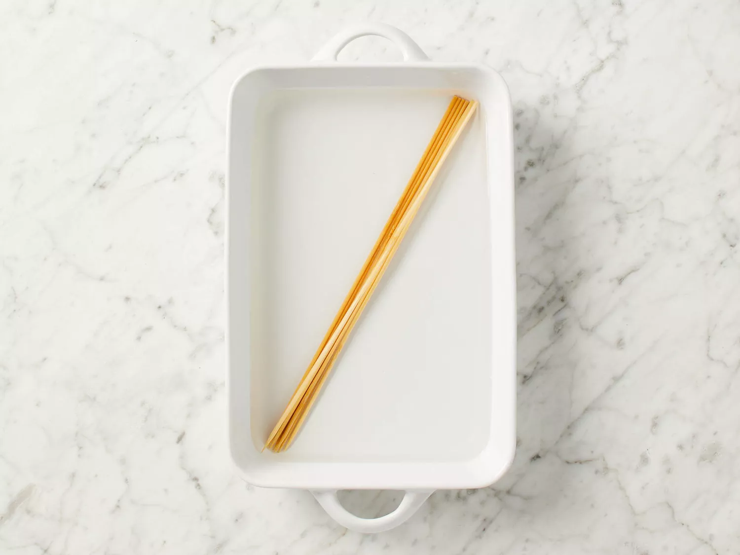 wooden skewers in water