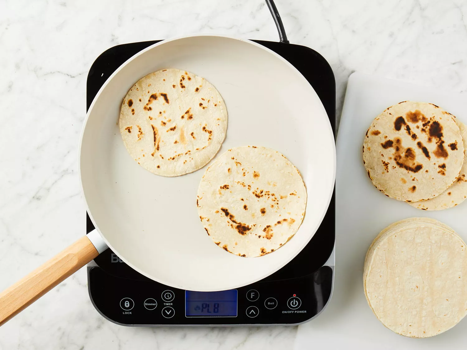 heating tortillas in pan